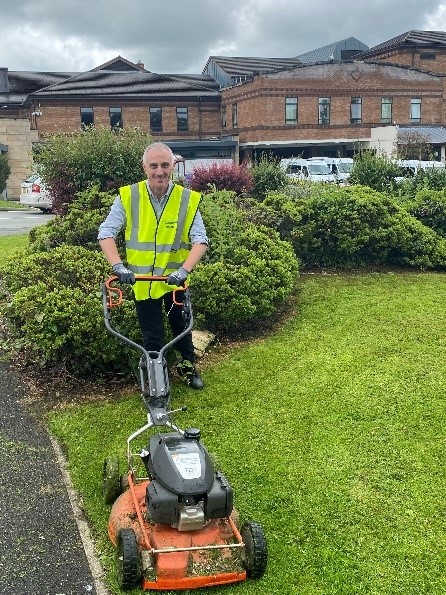 David Hounslea from estates. Mowing the grounds at Chorley Hospital