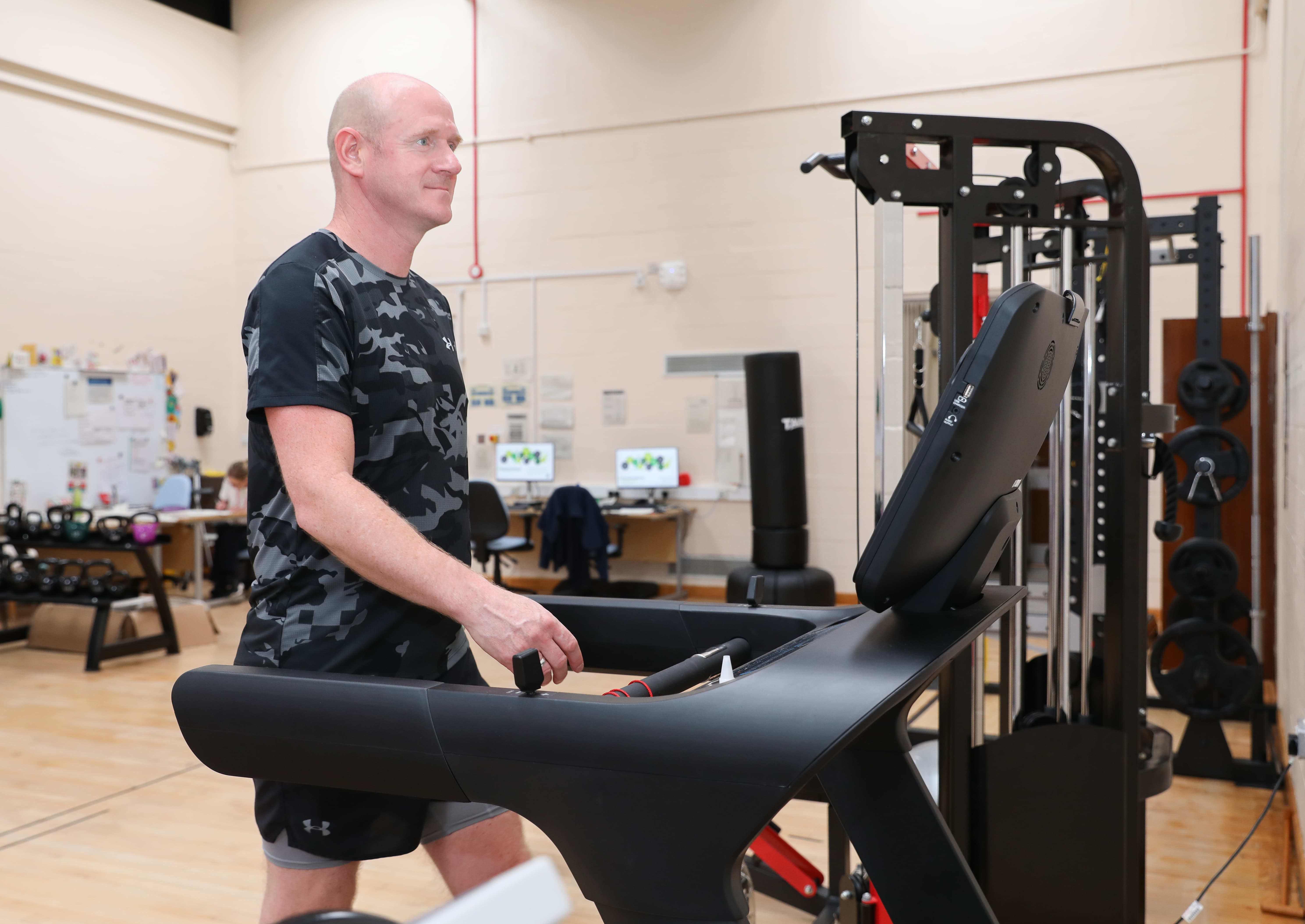 A man walking on a treadmill