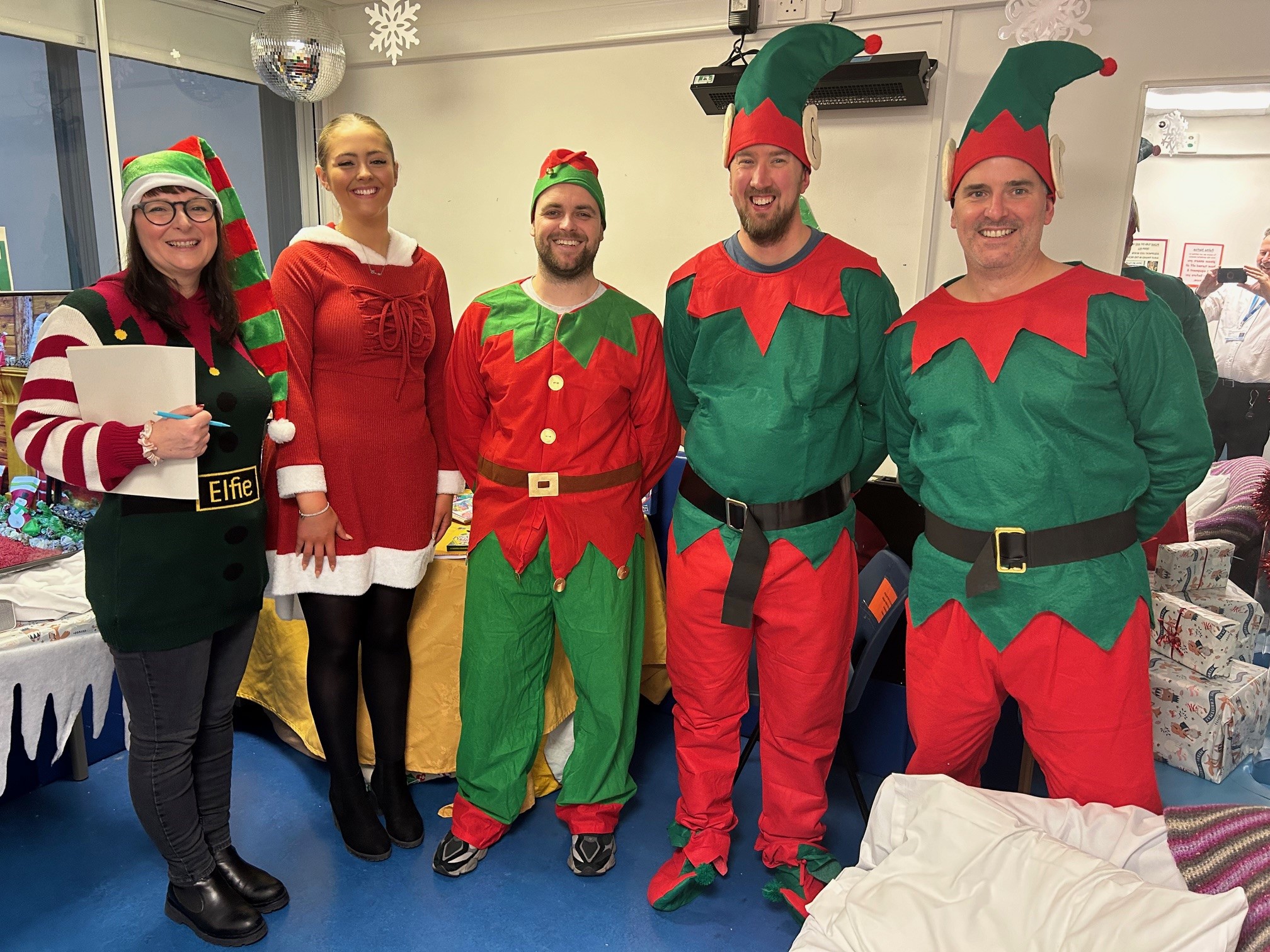 Cisco staff members dressed as Christmas elves