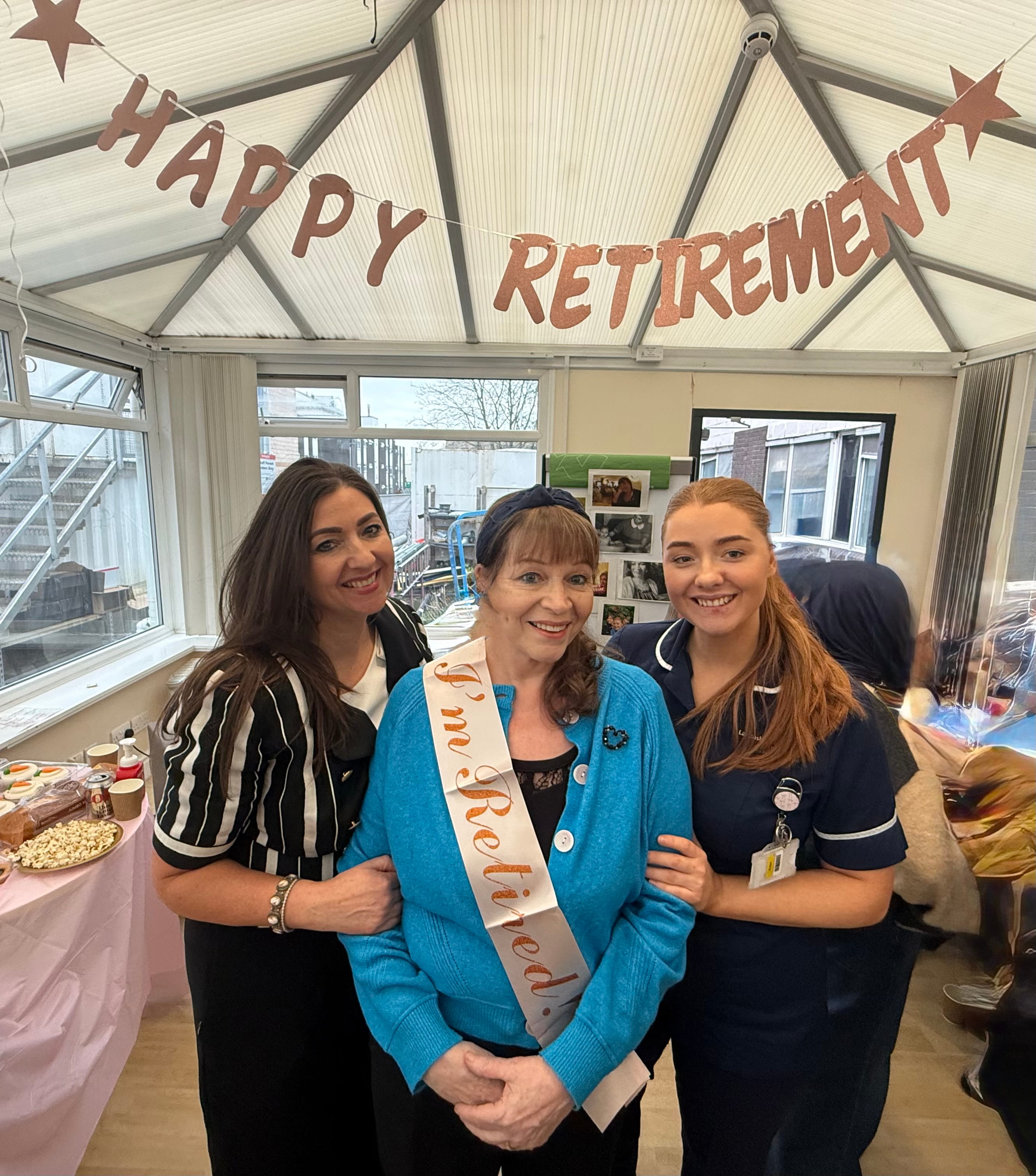 Noeleen and two other colleagues smiling, group photo
