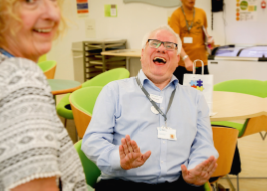 a lady and a man laughing