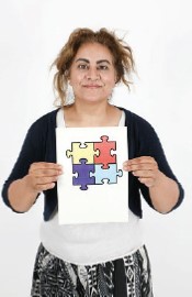 lady holding a jigsaw logo